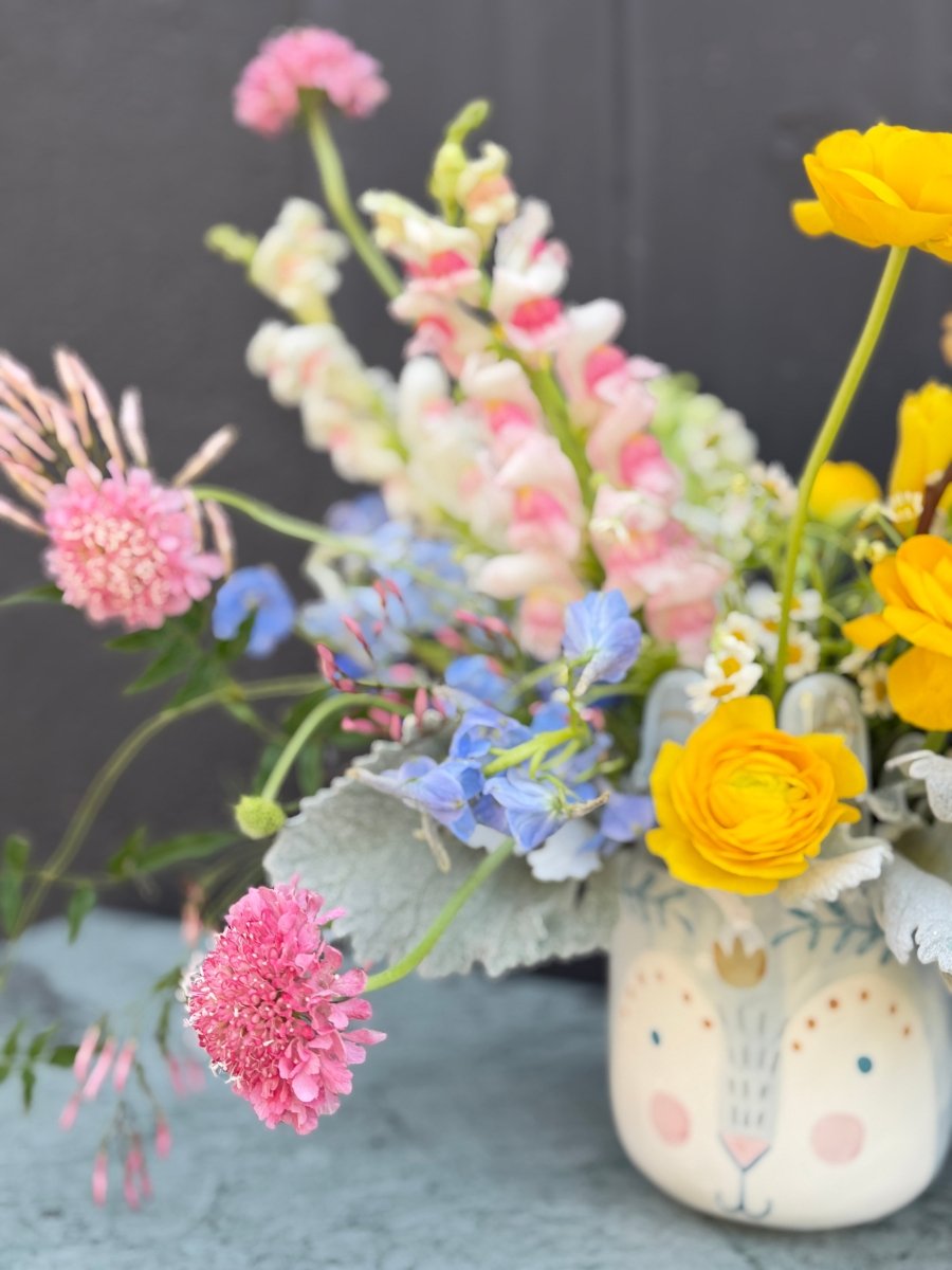 Hop into Spring! Ranunculus, Snap Dragon, Scabiosa Arrangement