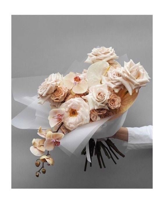 Bridal bouquet with orchid, roses, anthurium, hydrangea and garden rose