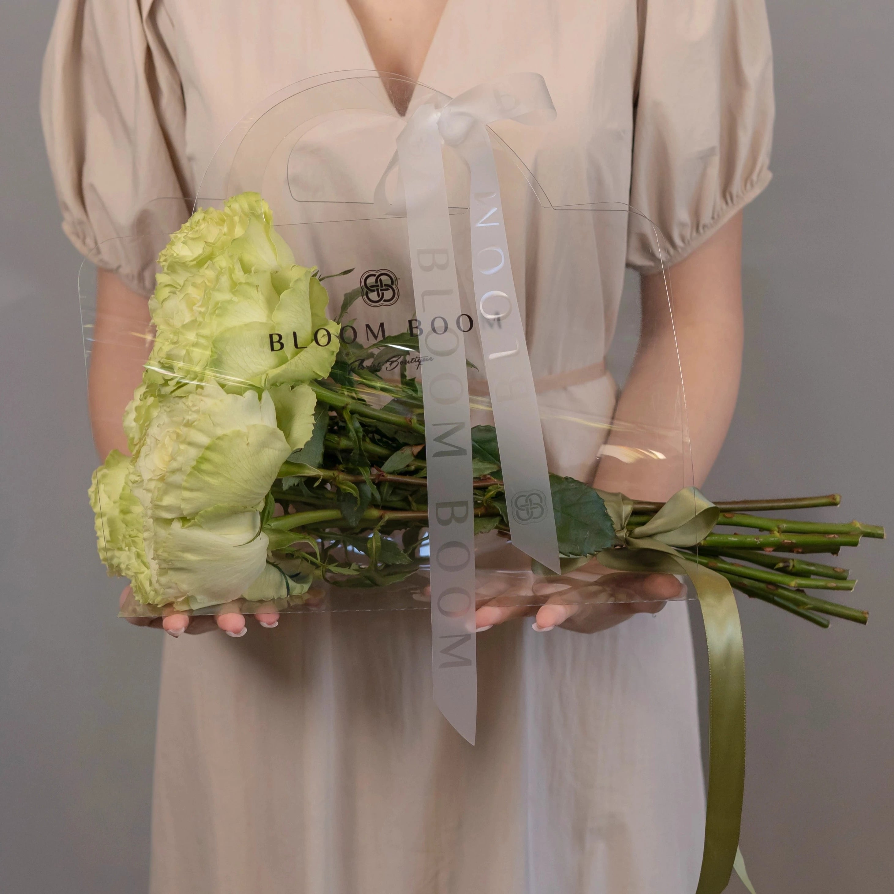 Green rose bouquet with white satin ribbon by Bloom Boom Flowers Los Angeles florist