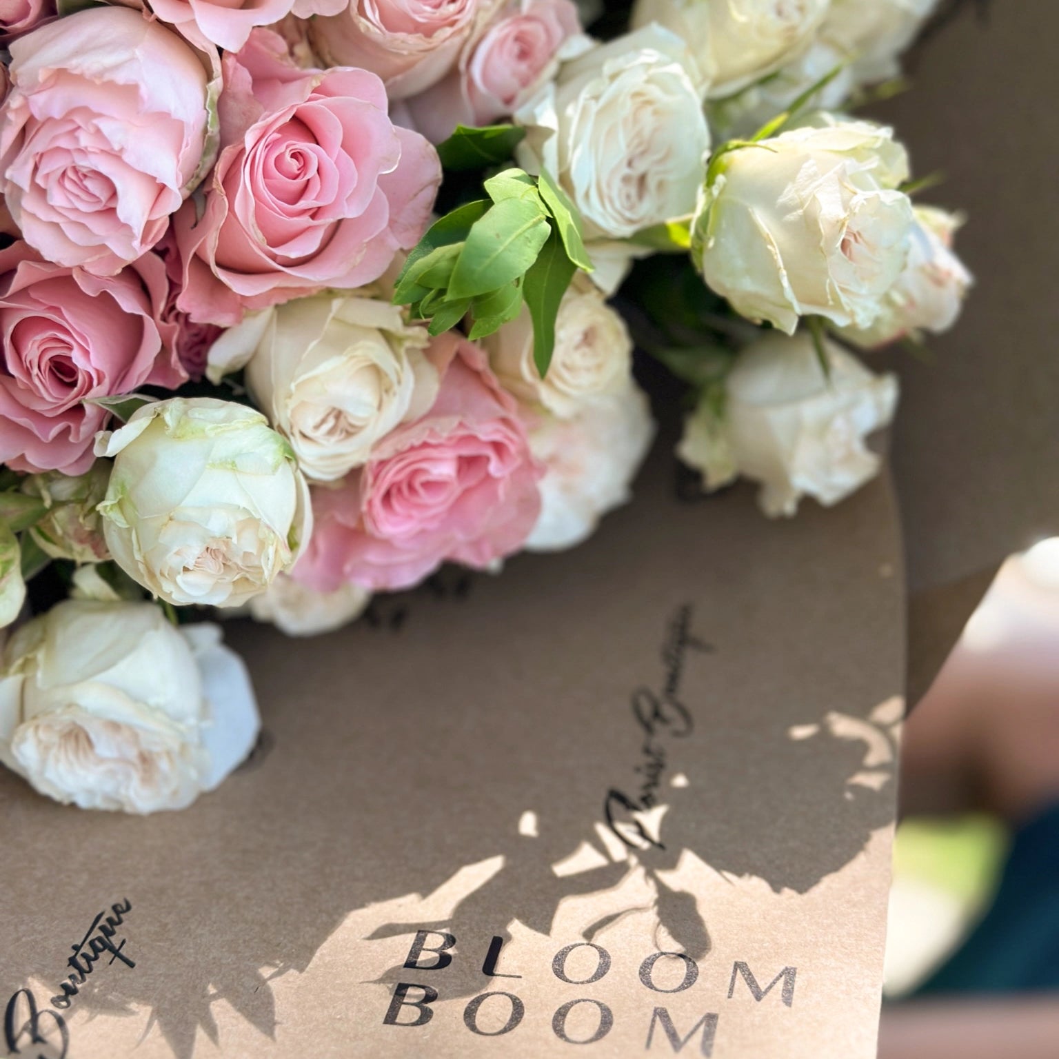 Pink and white rose bouquet with ranunculus flowers from Bloom Boom Flowers Los Angeles florist