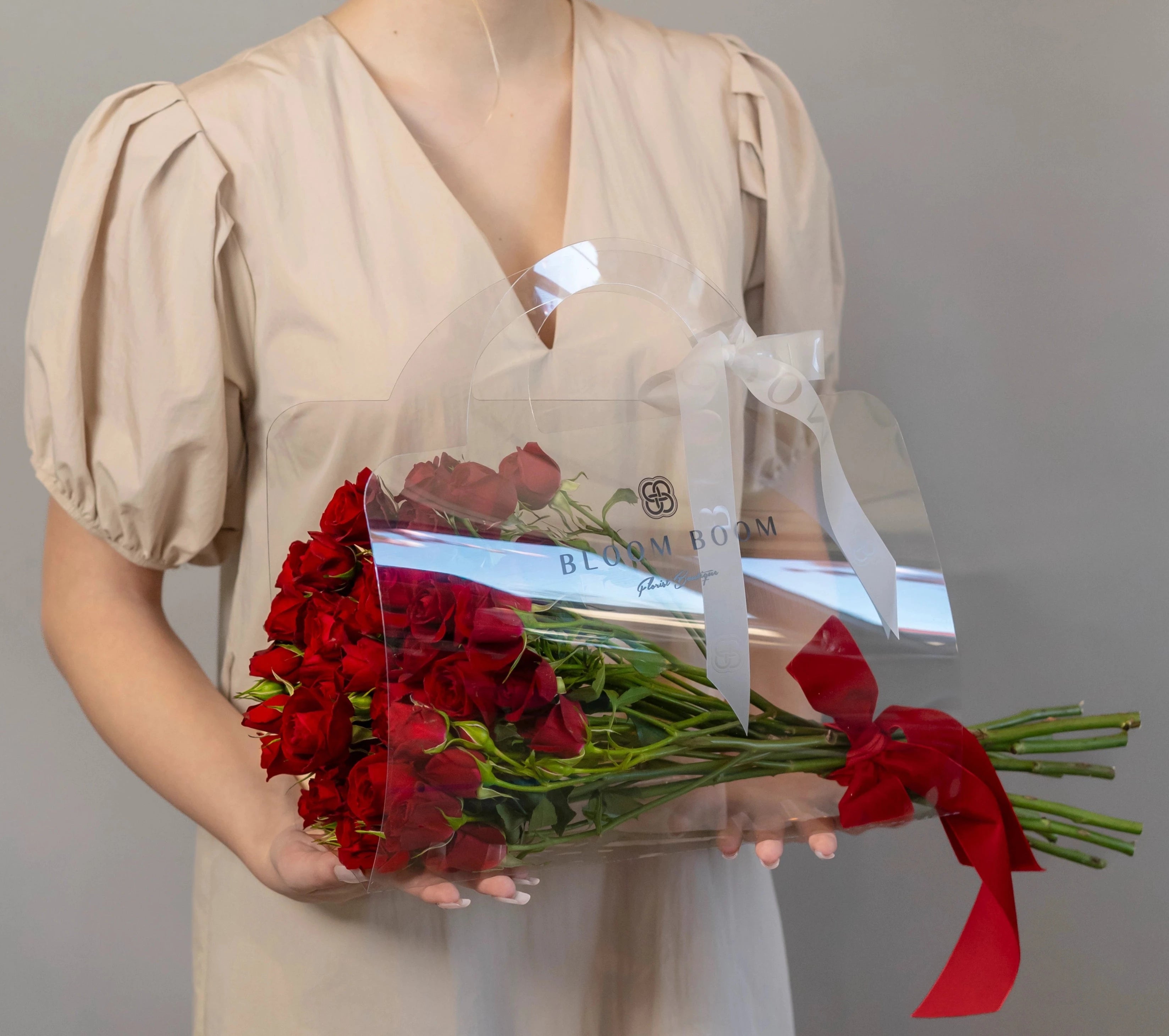 Red roses in clear acrylic flower box with red ribbon from Bloom Boom Flowers Los Angeles florist