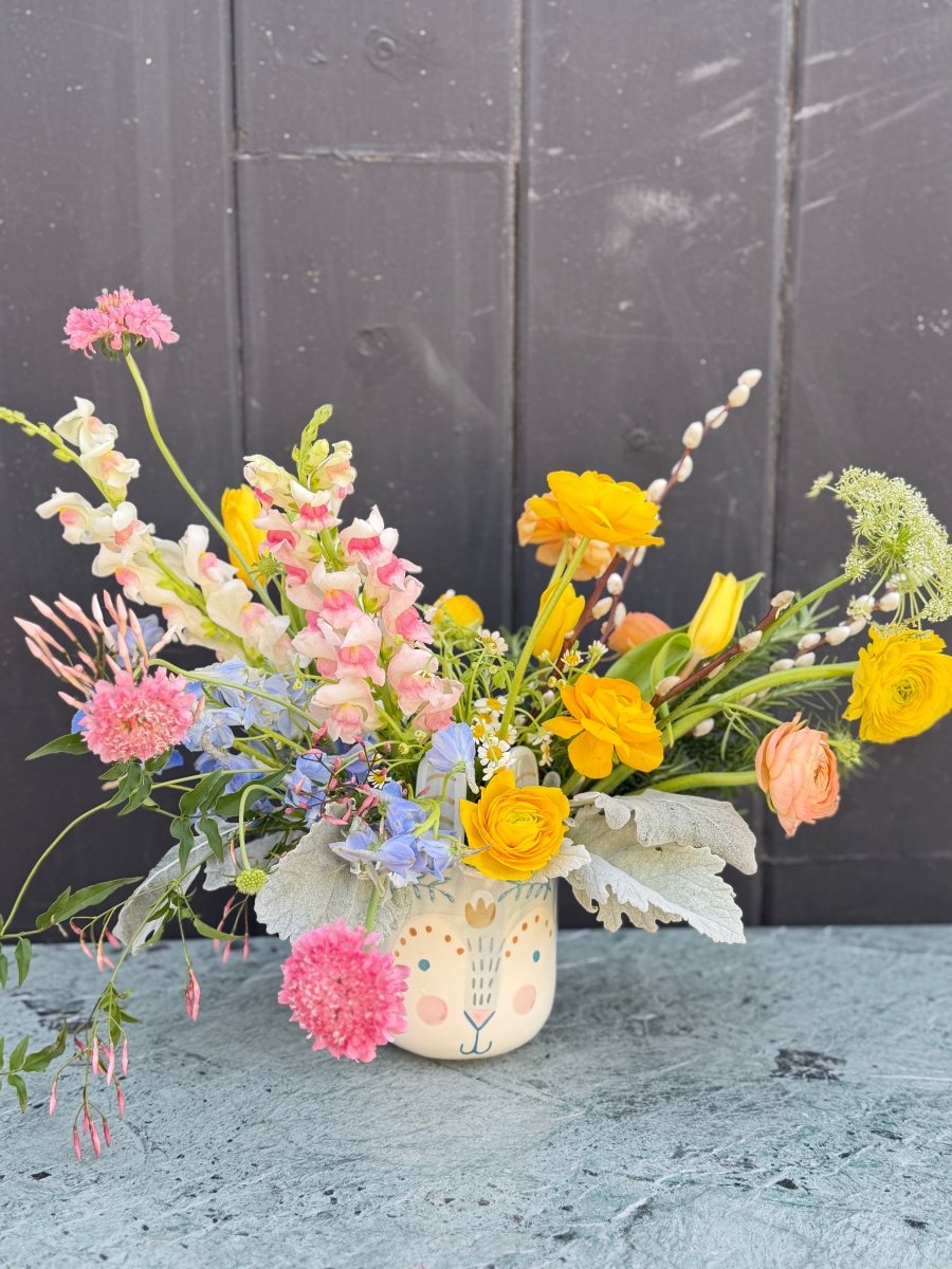Hop into Spring! Ranunculus, Snap Dragon, Scabiosa Arrangement