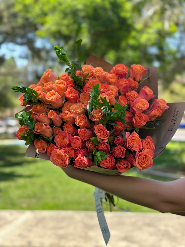 Mono bouquet of coral roses