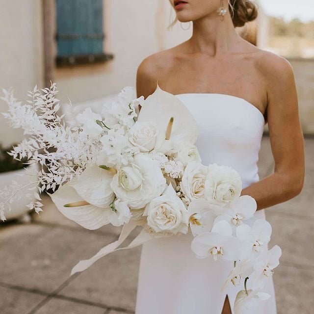 Bridal bouquet with anthurium, ranunculus and roses