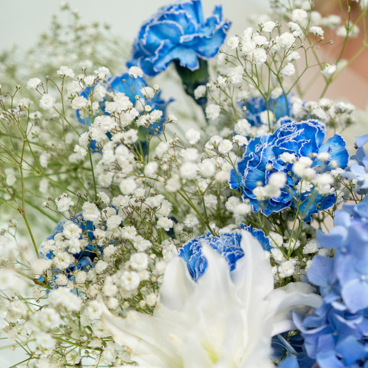 Bouquet "Emerald Enchantment" with lily and gypsophila