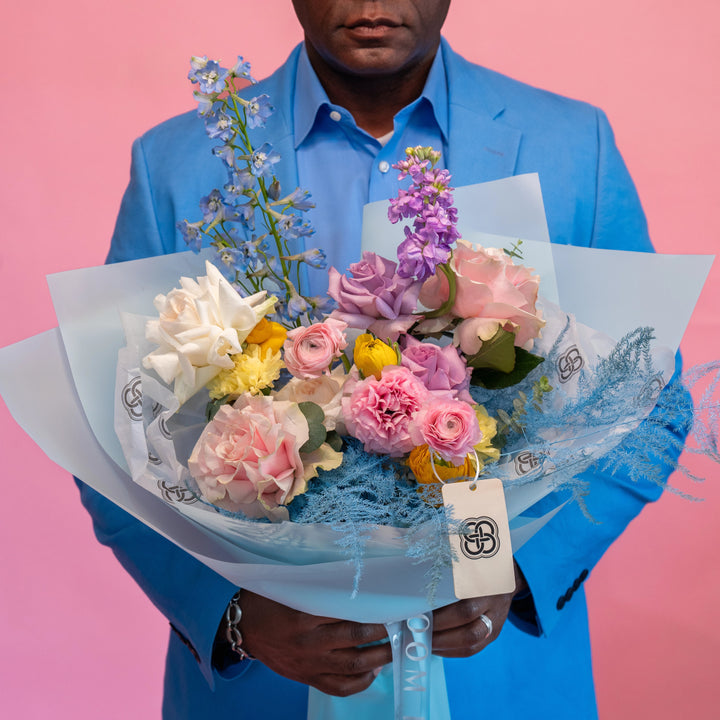 Simple bouquet "Rainbow" with roses and delphinium