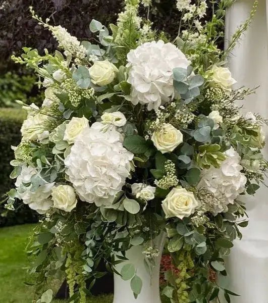 Majestic standing spray floral designs for $500 services