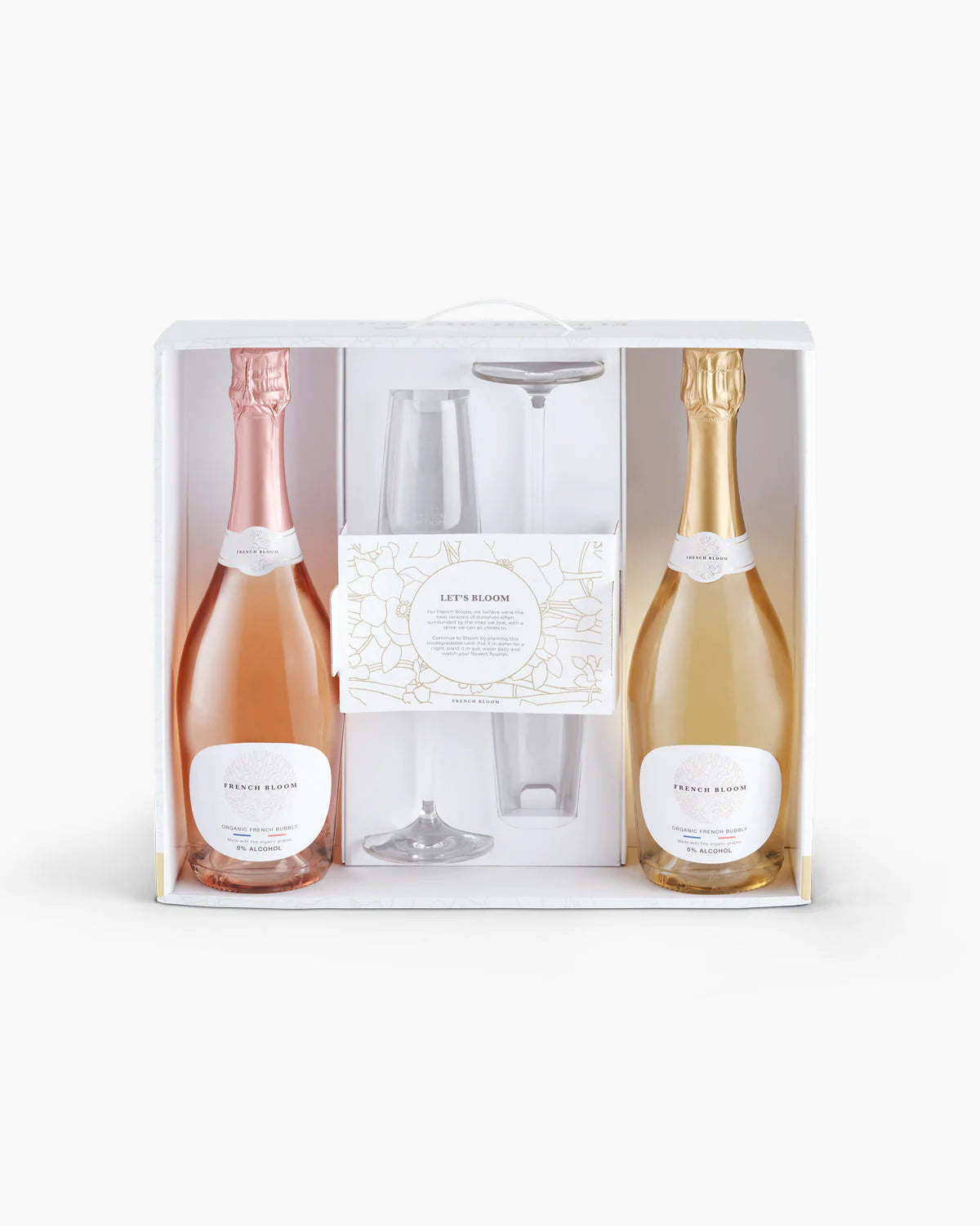 French Bloom champagne gift box with rosé and gold bubbly bottles, crystal flutes and Let's Bloom greeting card