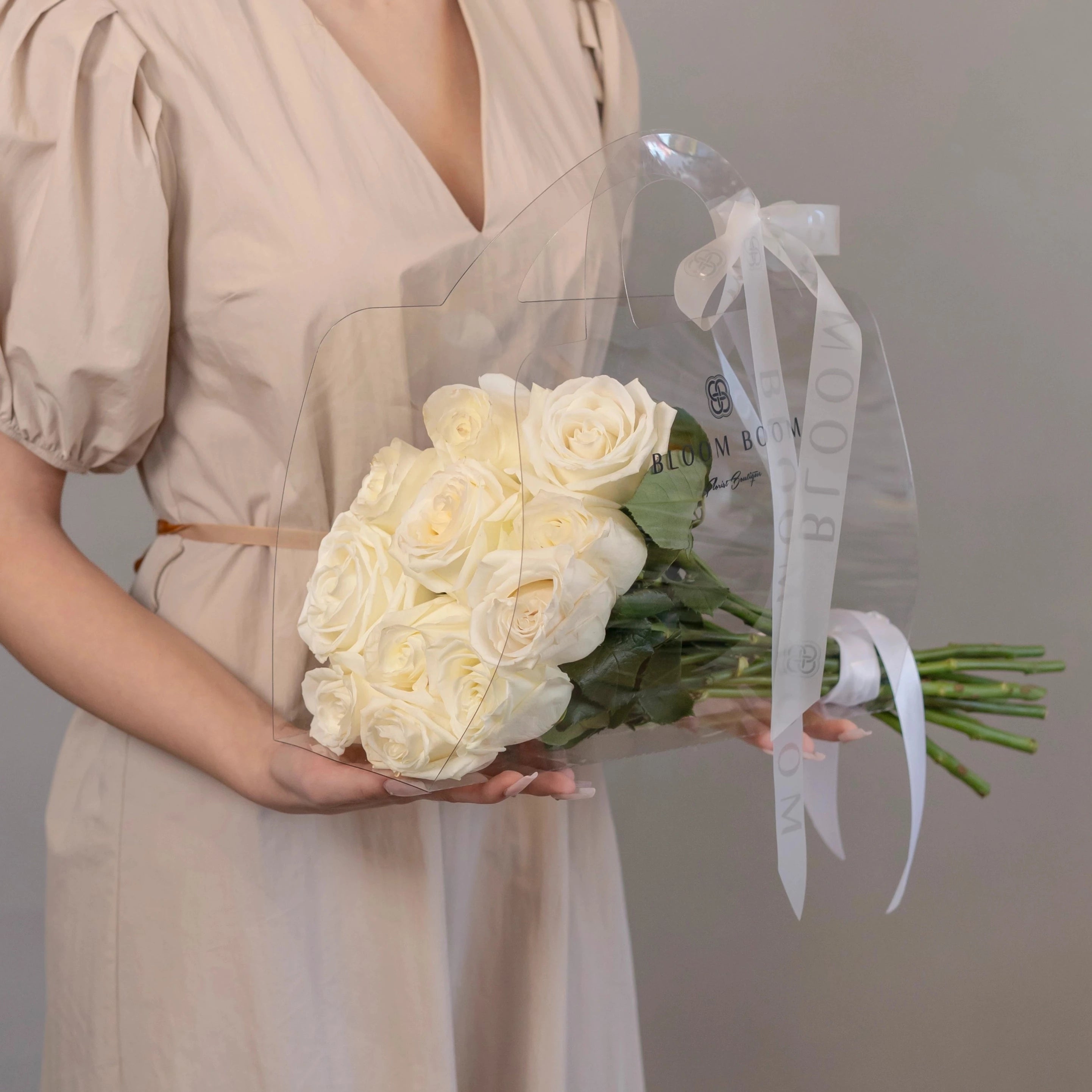 White rose bouquet with 12 stems in clear cellophane wrap with ribbon - Bloom Boom Flowers Los Angeles delivery